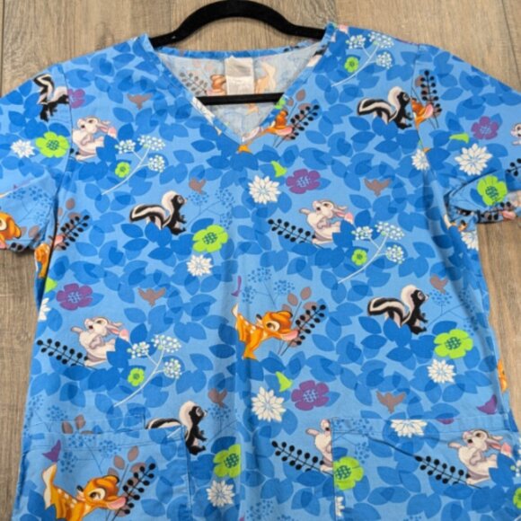 Disney Scrubs Top Womens Small Blue Bambie All Over Print Short Sleeve V Neck - Picture 1 of 9